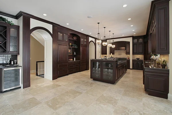 Kitchen with dark wood cabinetry