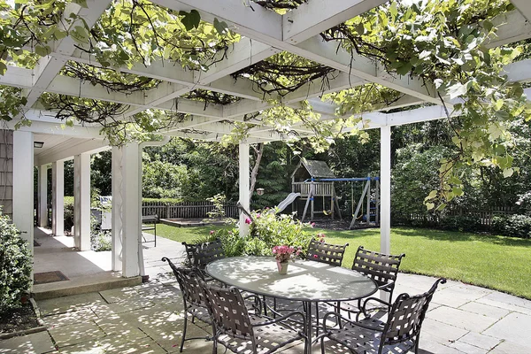 Patio with white wood beams