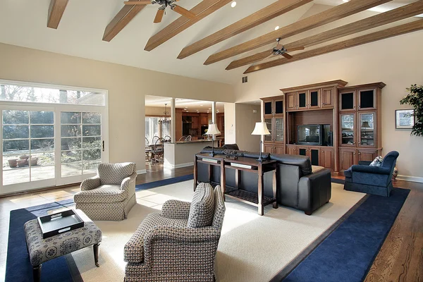 Family room with wood beams