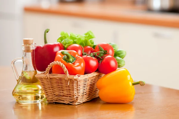 Healthy food fresh vegetables in basket and bottle with sunflowe