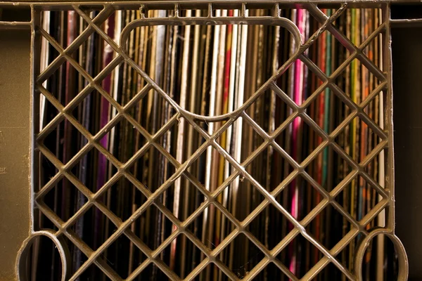 Old Weathered Stacked Vinyl LP Covers in Milk Crate