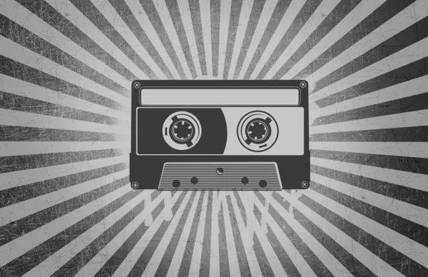Cassette Tape over Grey Background Rays Grunge