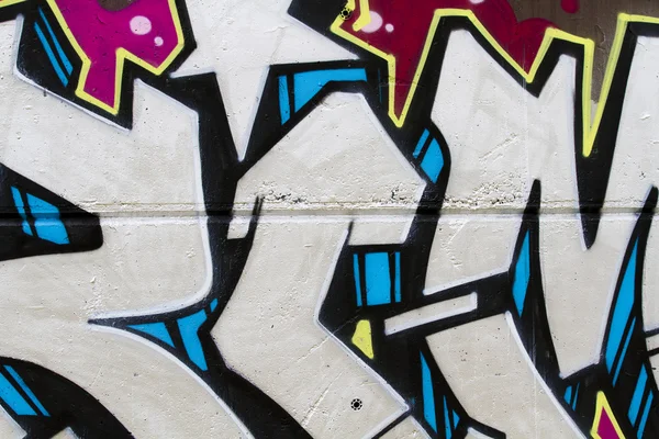 Segment of graffiti wall background, urban street grunge art des