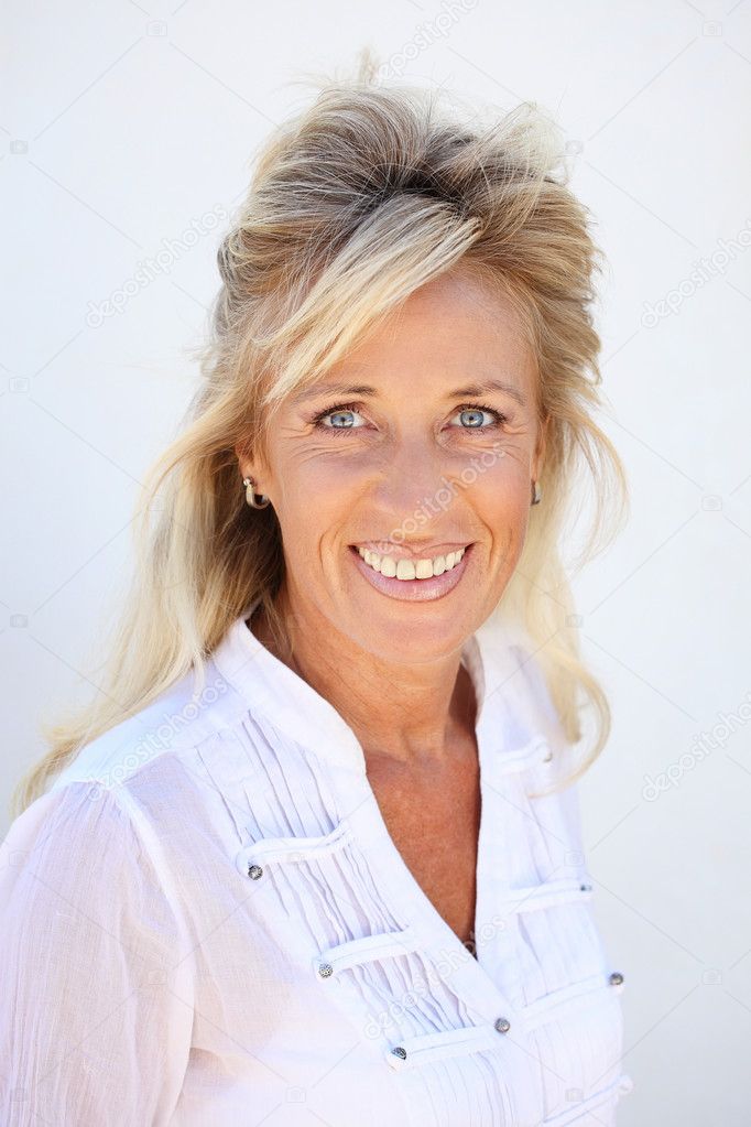 Portrait of beautiful middle aged businesswoman working on laptop Indoors depositphotos 8731657 Beautiful mature woman. Portrait of beautiful middle aged businesswoman working on laptop Indoors