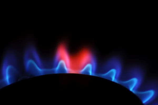 Flame of gas like heart, isolated on black background