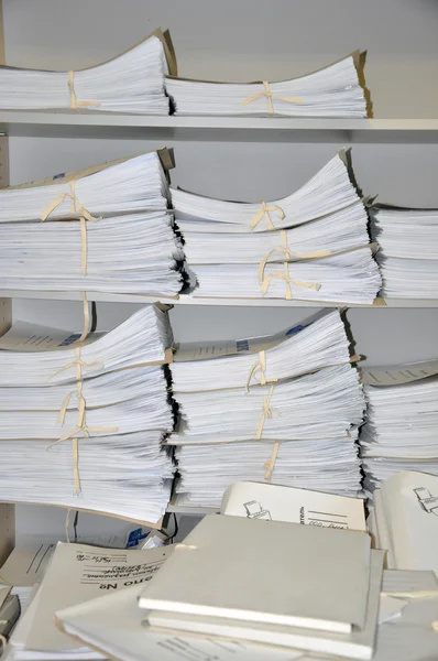 Documents folder on a shelf.