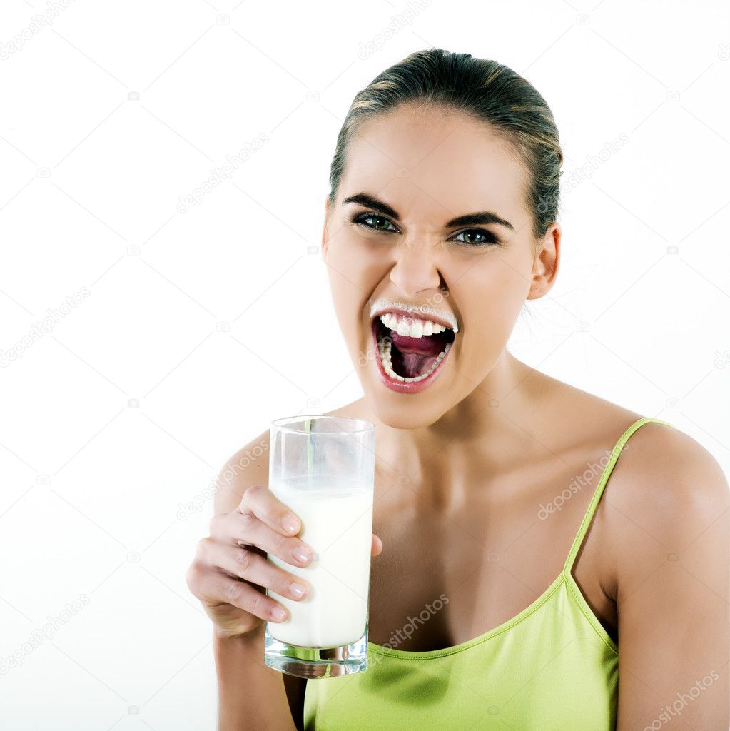 Woman drinking milk — Stock Photo © STYLEPICS 10149224