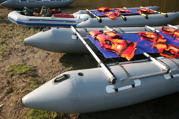 Catamarans for rafting on river bank