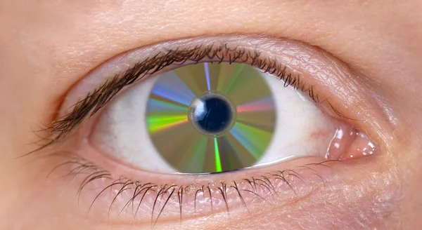 Close up from an eye with cd — Stock Photo #9509723