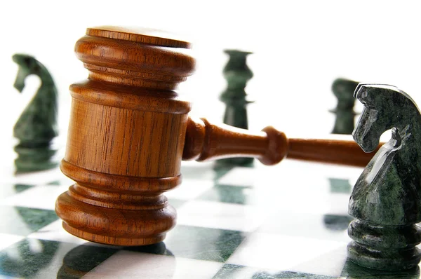 Gavel on a chess board
