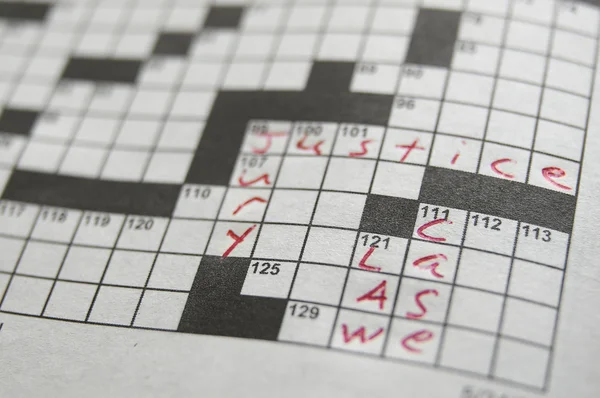 Closeup if a crossword puzzle with legal terms