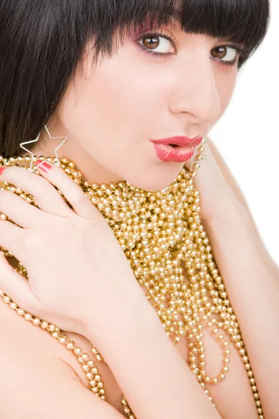 Portrait of fashion woman with gold necklace