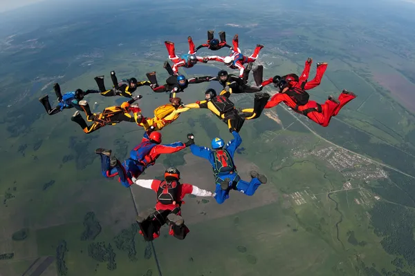 Group of skydivers flying in formation
