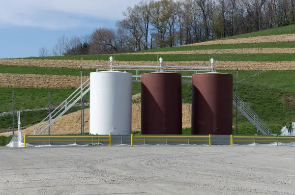 Storage tanks on a gas well site