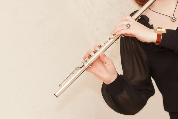 Flute in hand