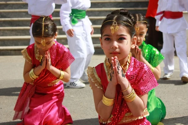 Children students dancing in Indian costumes for 23 April Children Festival