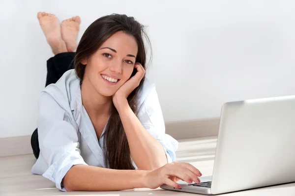 Portrait of attractive woman with laptop