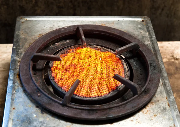 Hot fire from stove for cooking in kitchen