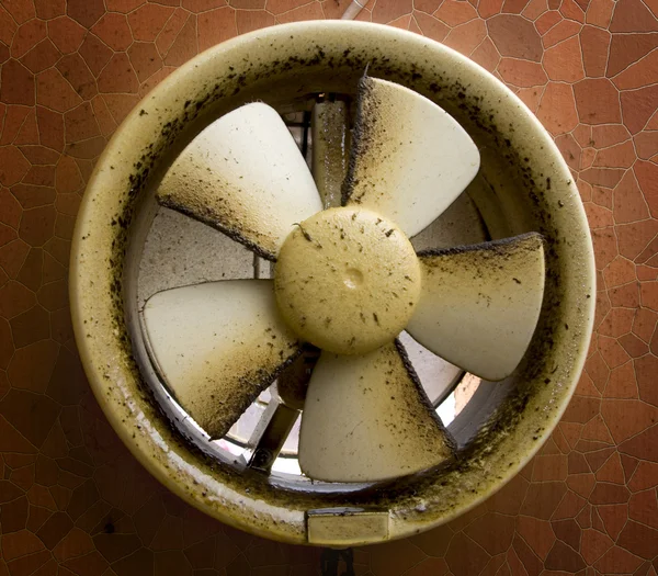 Dirty oil stained exhaust fan