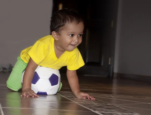 Infant Playing Soccer