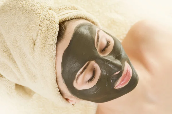 Spa. Mud Mask On The Woman\'s Face