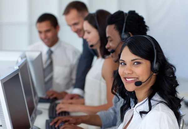 Business team working in a call center with a manager