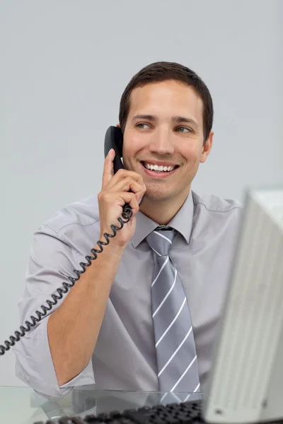 Male executive talking on phone