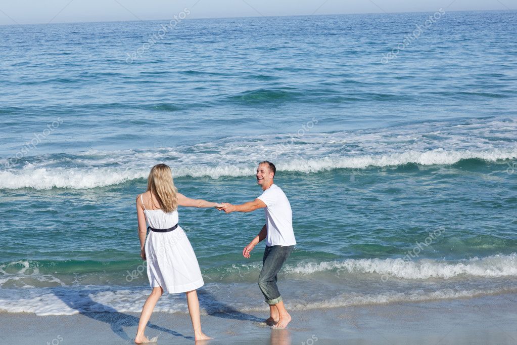 depositphotos_10294815-Affectionate-couple-walking-at-the-seaside.jpg