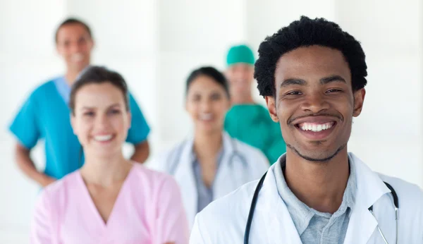 Multi-ethnic medical smiling at the camera