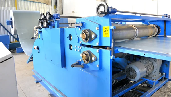 Machine for rolling steel sheet in warehouse