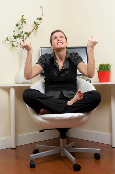 Frustrated home office worker in yoga postion