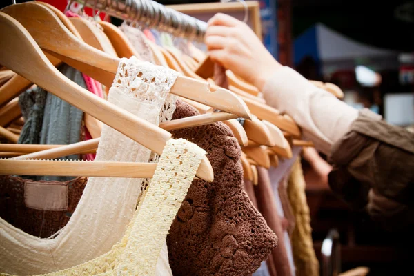 Rack of dresses at market