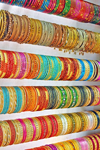 Rows of colorful bangles