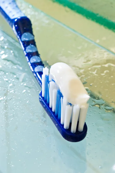 Toothbrush with paste. hygiene and medicine concept.