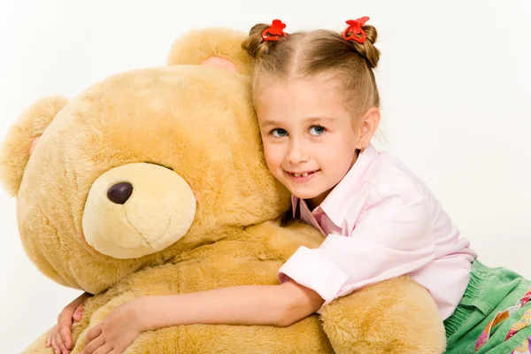 Girl with teddy bear