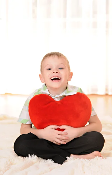Child with a heart — Stock Photo, Image