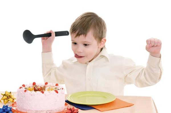 Junge mit Kuchen — Stockfoto
