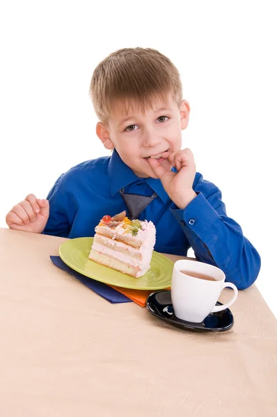 Criança com bolo — Fotografia de Stock