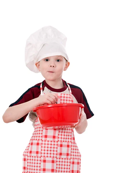 Мальчик в шляпе шеф-повара — стоковое фото