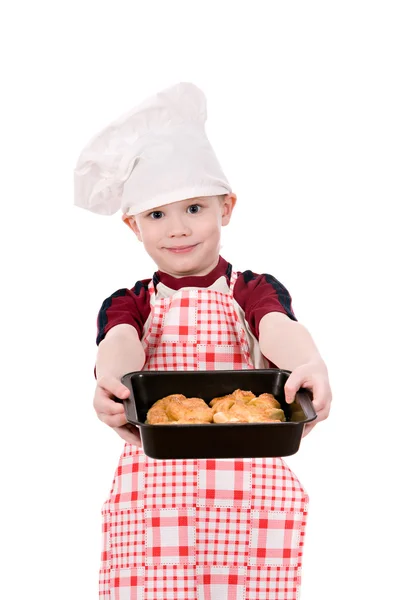 Niño en sombrero de chef con hornear —  Fotos de Stock