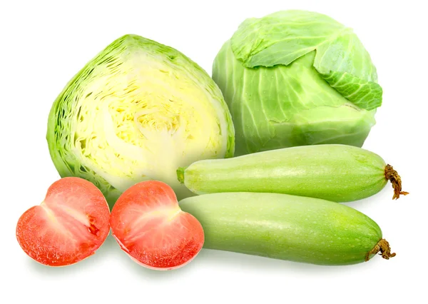 Zielona kapusta, kostnego i czerwone pomidory — Zdjęcie stockowe
