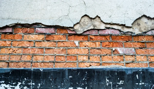 Parede de tijolo rachado — Fotografia de Stock