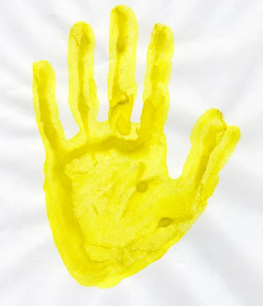 Carimbo amarelo handprint — Fotografia de Stock