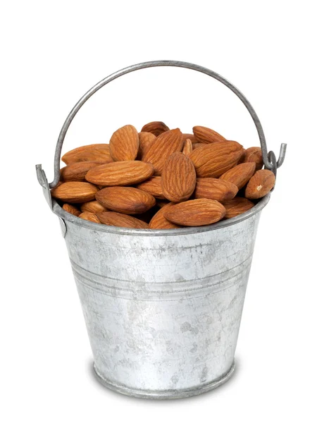 Tin bucket with almonds — Stock Photo, Image