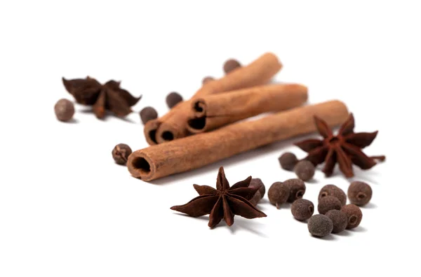 Cinnamon sticks, anise stars and black peppercorns — Fotografia de Stock