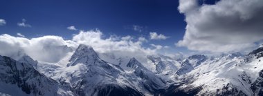 Mountains panorama. View from the ski slope. clipart