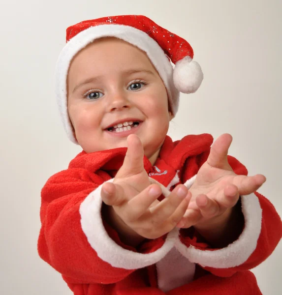 可爱微笑着圣诞老人蹒跚学步的小姑娘 — 图库照片