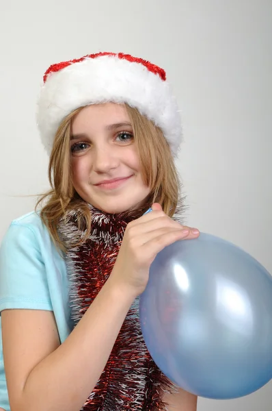 Cute xmas girl with a balloon — Stock Photo, Image
