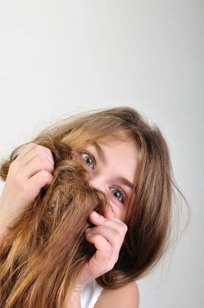 stock image Girl hiding behind her hair