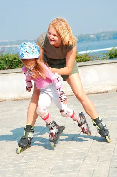 Child on inline rollerblade skates Royalty Free Stock Images